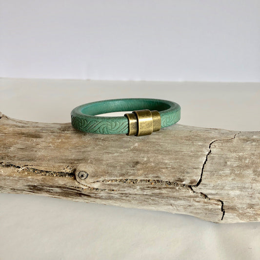 Leather bracelet, made of fine green Italian licorice leather, finished with a quality silver magnetic bullet style clasp.
