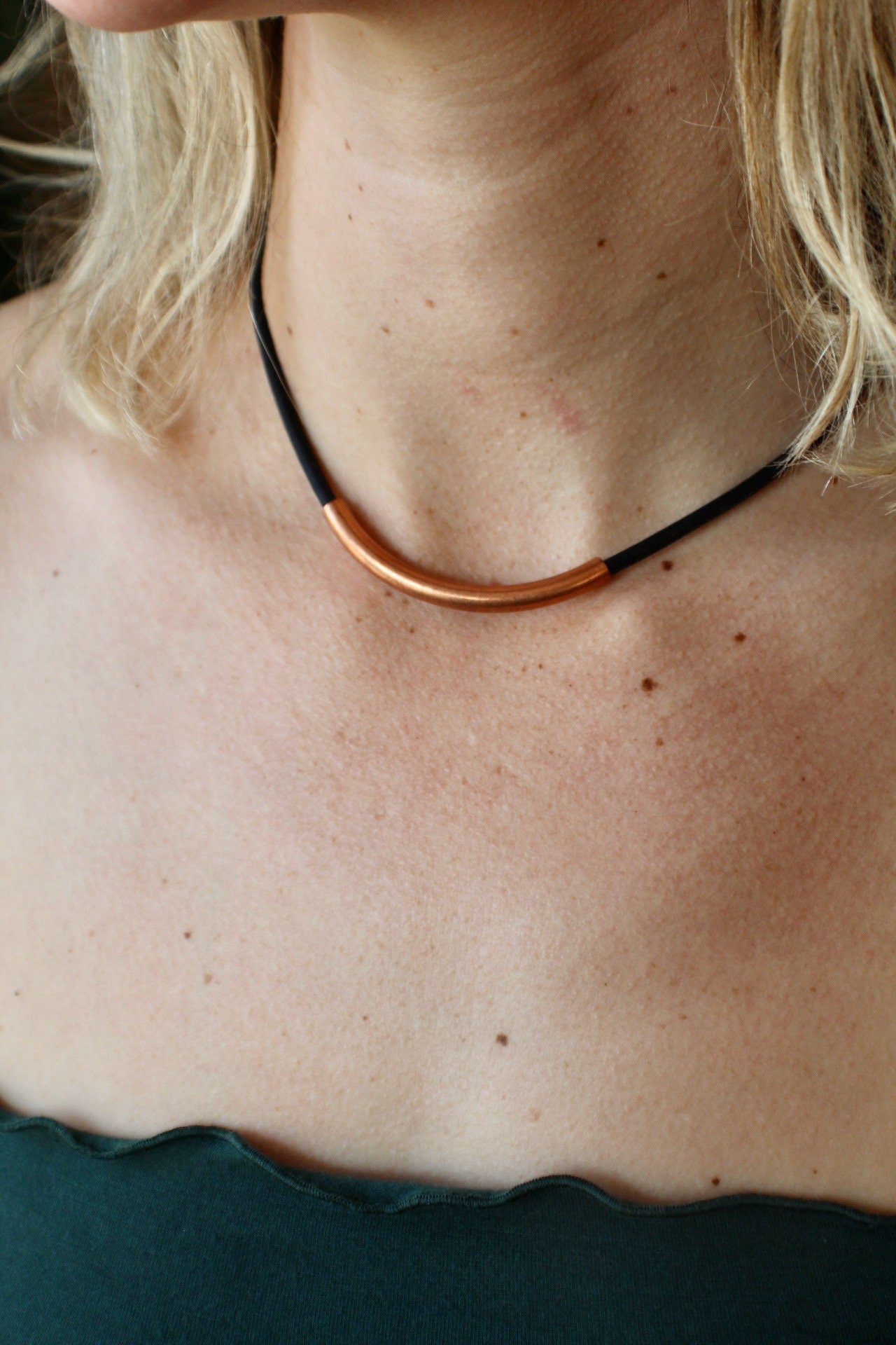 Beautiful Italian black leather choker necklace fashioned with a center curved copper tube. Finished with a magnetic clasp.