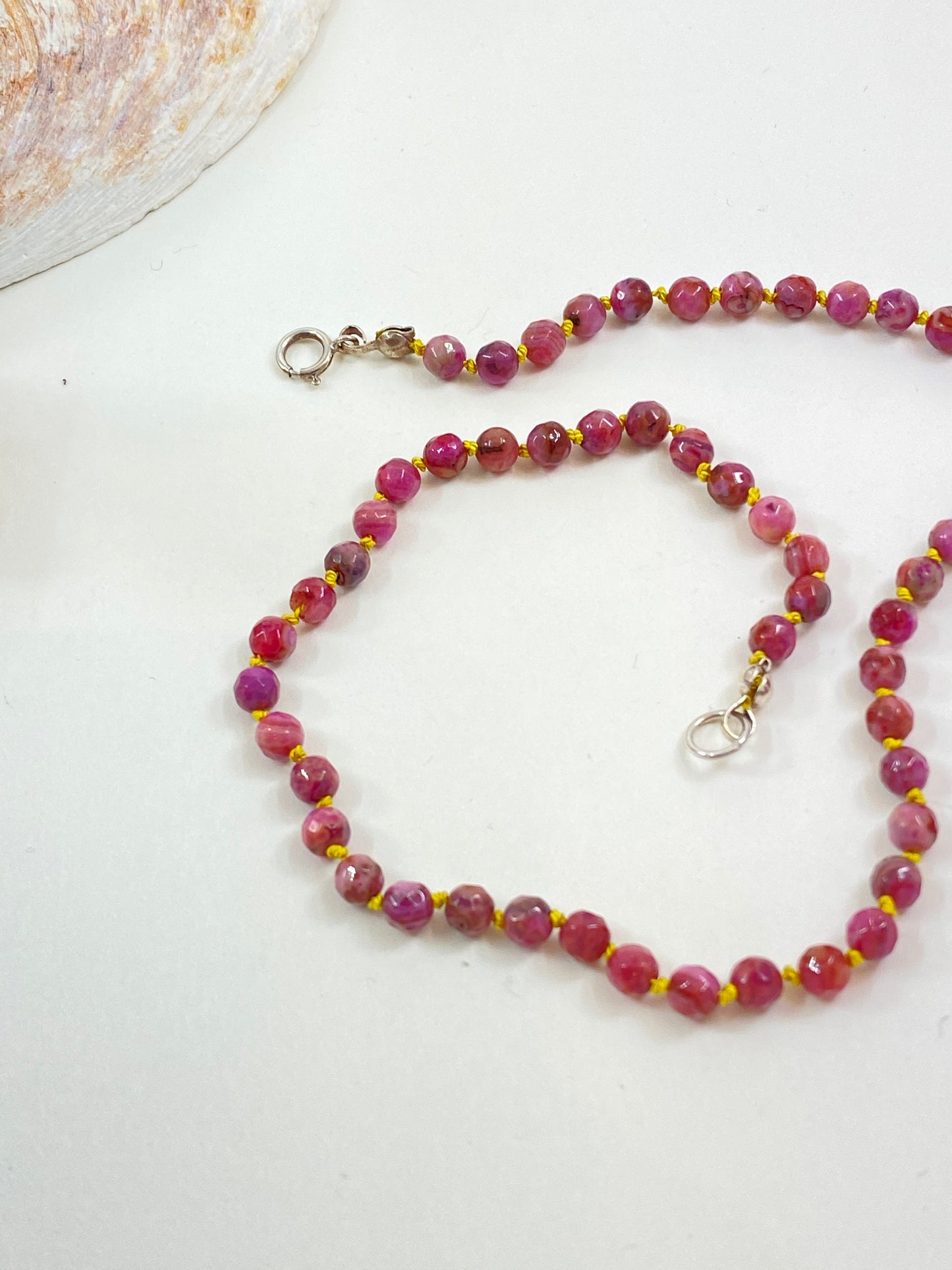 Children's precious rose agate beaded necklace. Knotted safely with silk thread, to be worn in sweetness and joy.