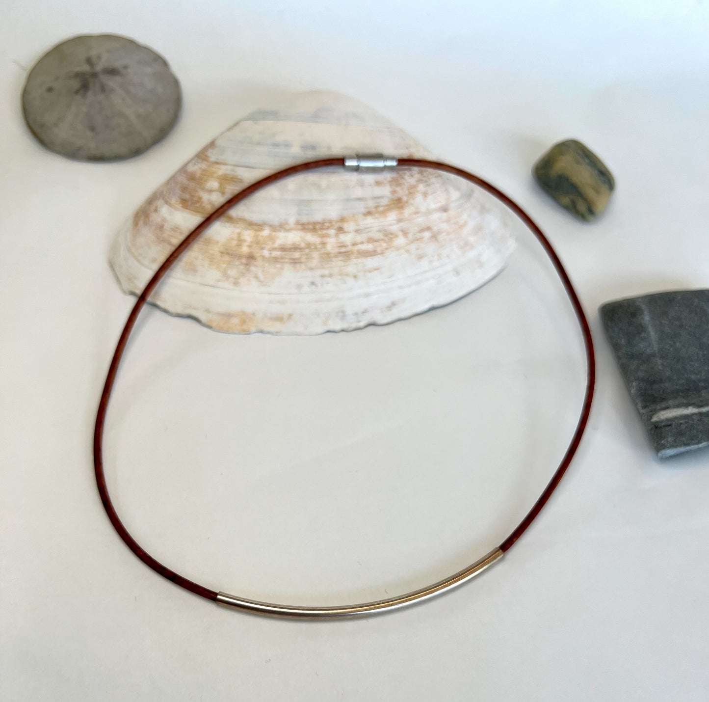 Leather Necklace. Sterling sliver choker necklace with curved tube strung on soft beautiful leather with sterling clasp