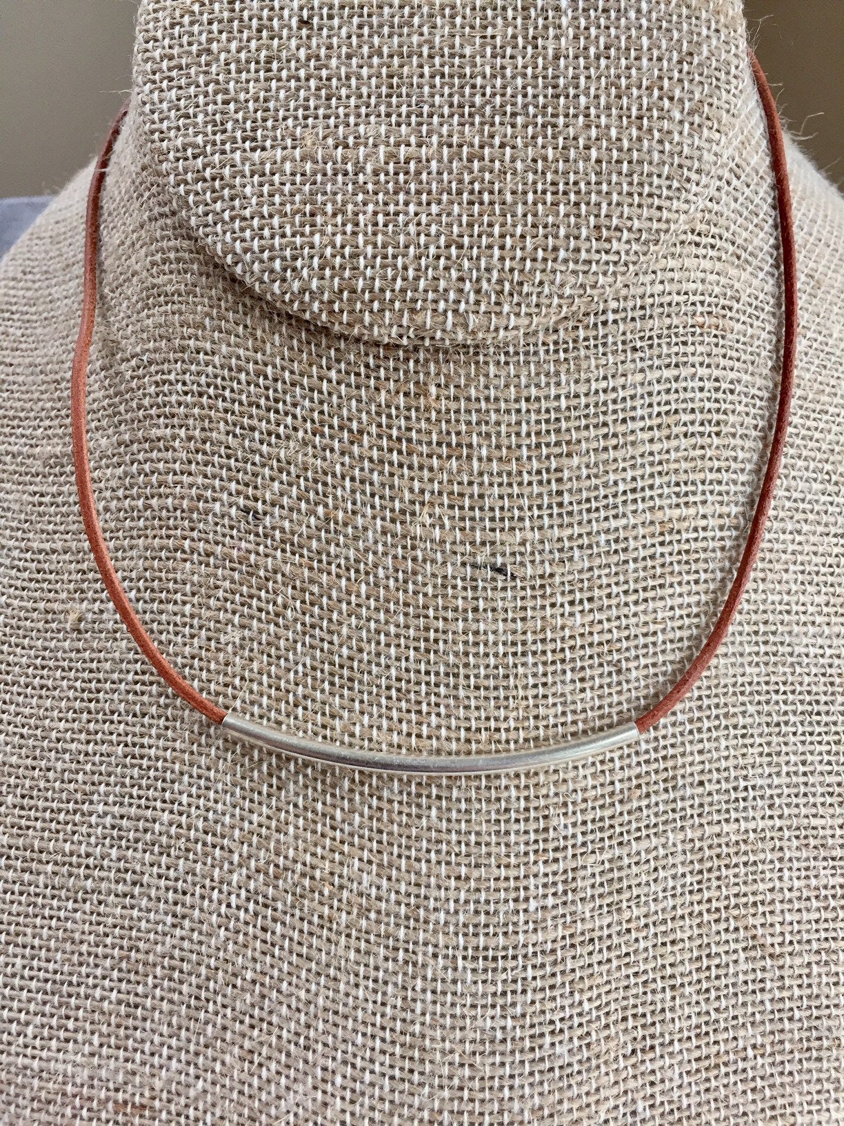 Leather Necklace. Sterling sliver choker necklace with curved tube strung on soft beautiful leather with sterling clasp