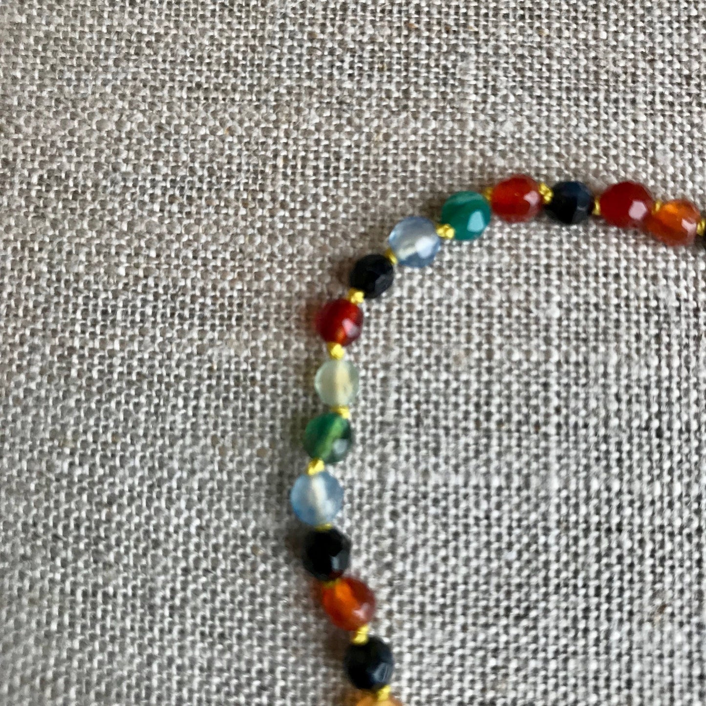 Children's precious multi-agate beaded necklace. Knotted safely with silk thread, to be worn in sweetness and joy.