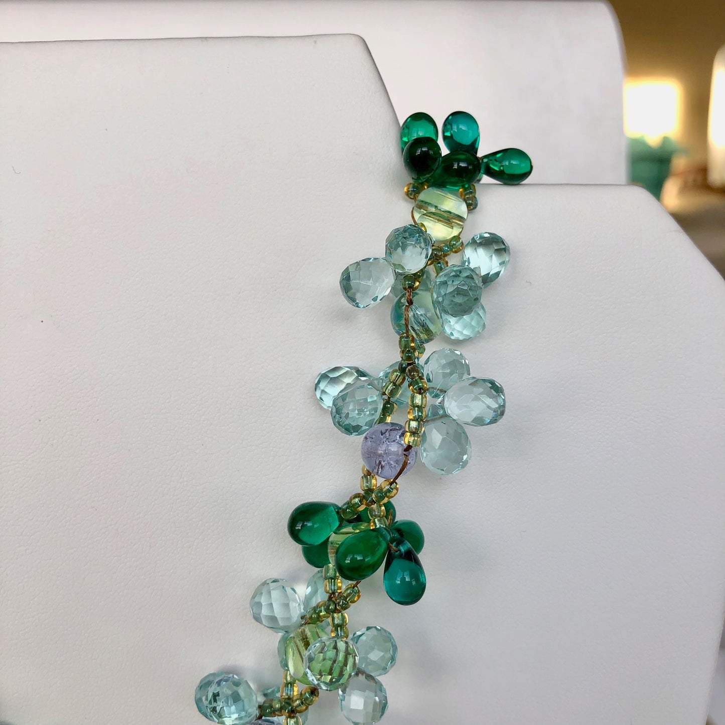Stunning necklace hand beaded with aurora borealis tinted mint green and light blue glass beads. A garden for your neck.