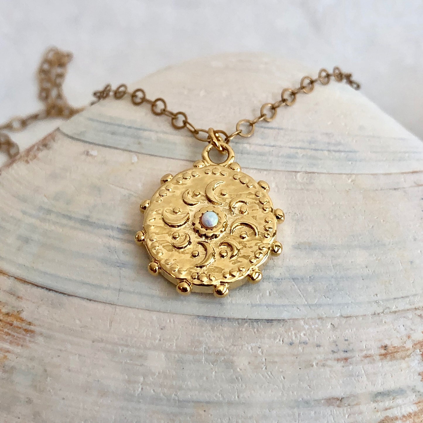 Gorgeous gold coin celestial pendant with sweet opal drop in the center. Beautiful graduation gift. 14 karat gold filled chain.