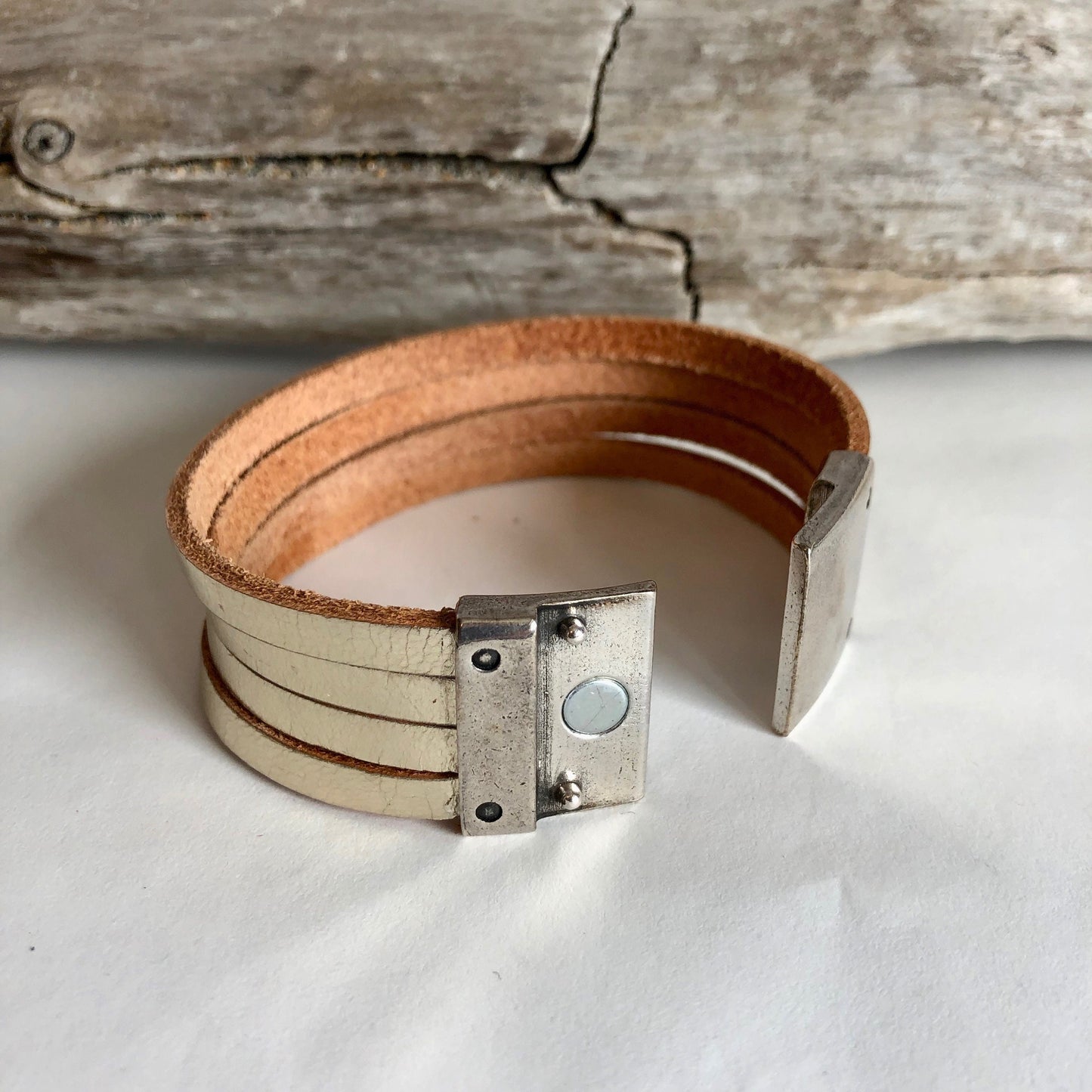 Leather bracelet, made with beautiful soft gold Italian leather, and finished with a quality silver magnetic riveted clasp.