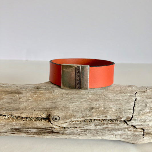 Leather bracelet, made with beautiful tangerine color Italian leather, and finished with a quality southwestern style silver magnetic clasp.