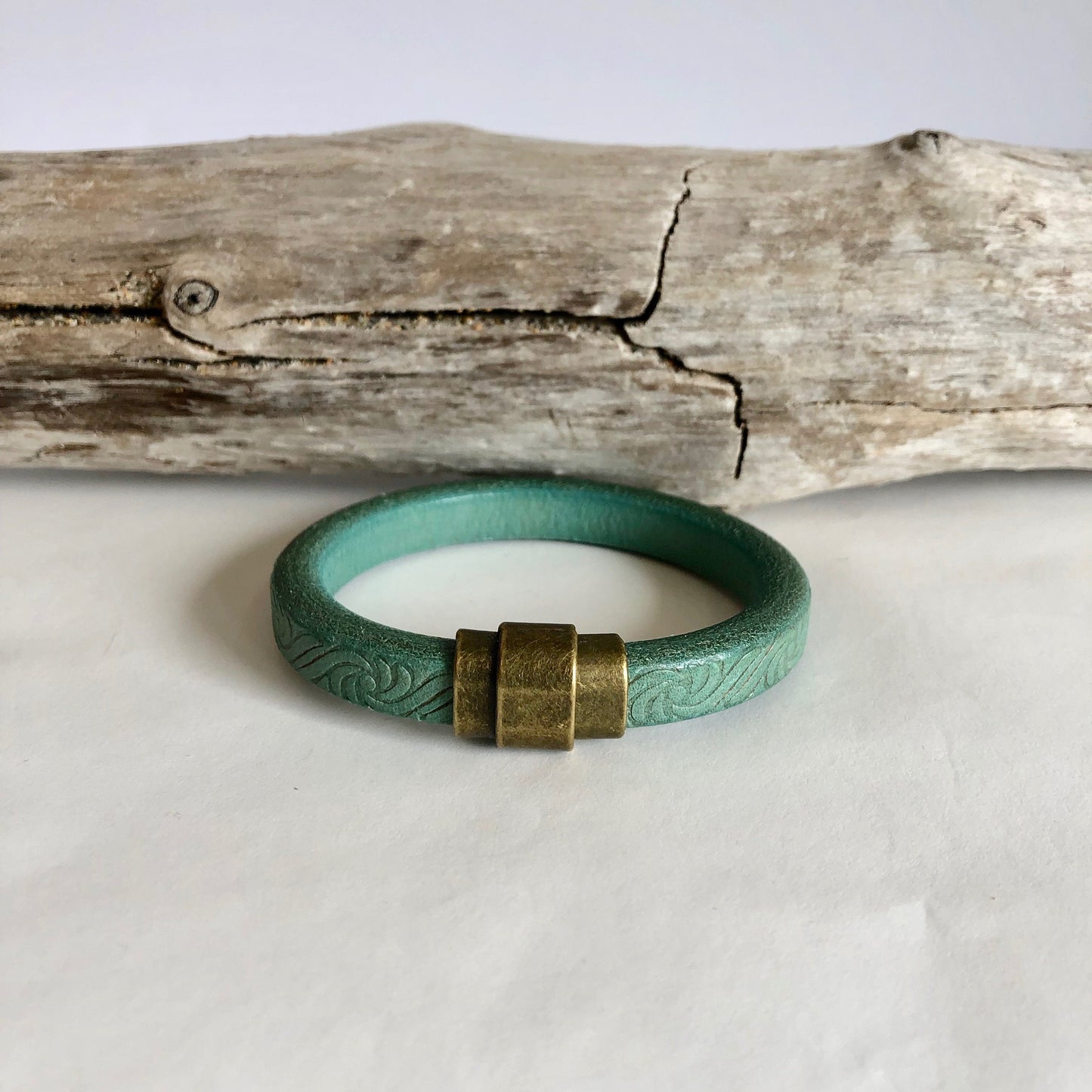 Leather bracelet, made of fine green Italian licorice leather, finished with a quality silver magnetic bullet style clasp.