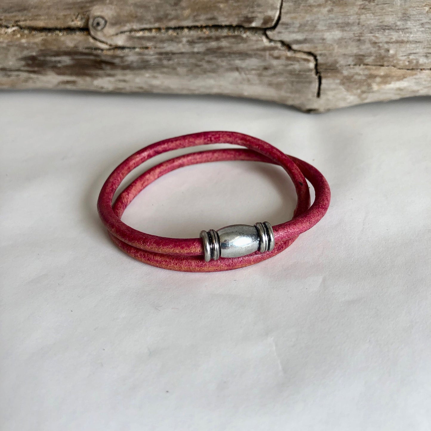 Leather bracelet, made of fine soft red Italian leather, and a fine magnetic tube clasp. Classic simplicity.