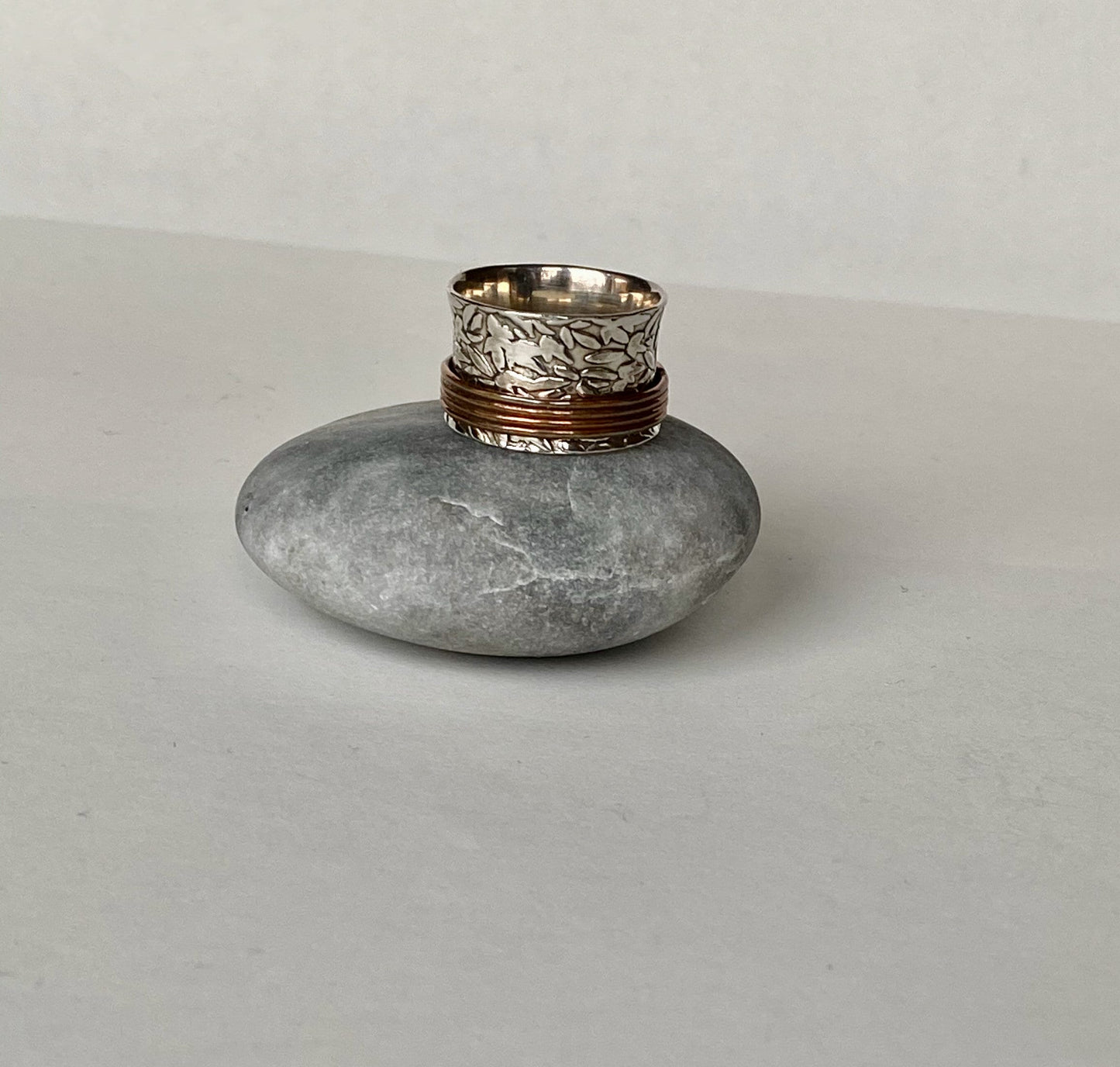 Handmade size 6 sterling silver and copper spinning ring.