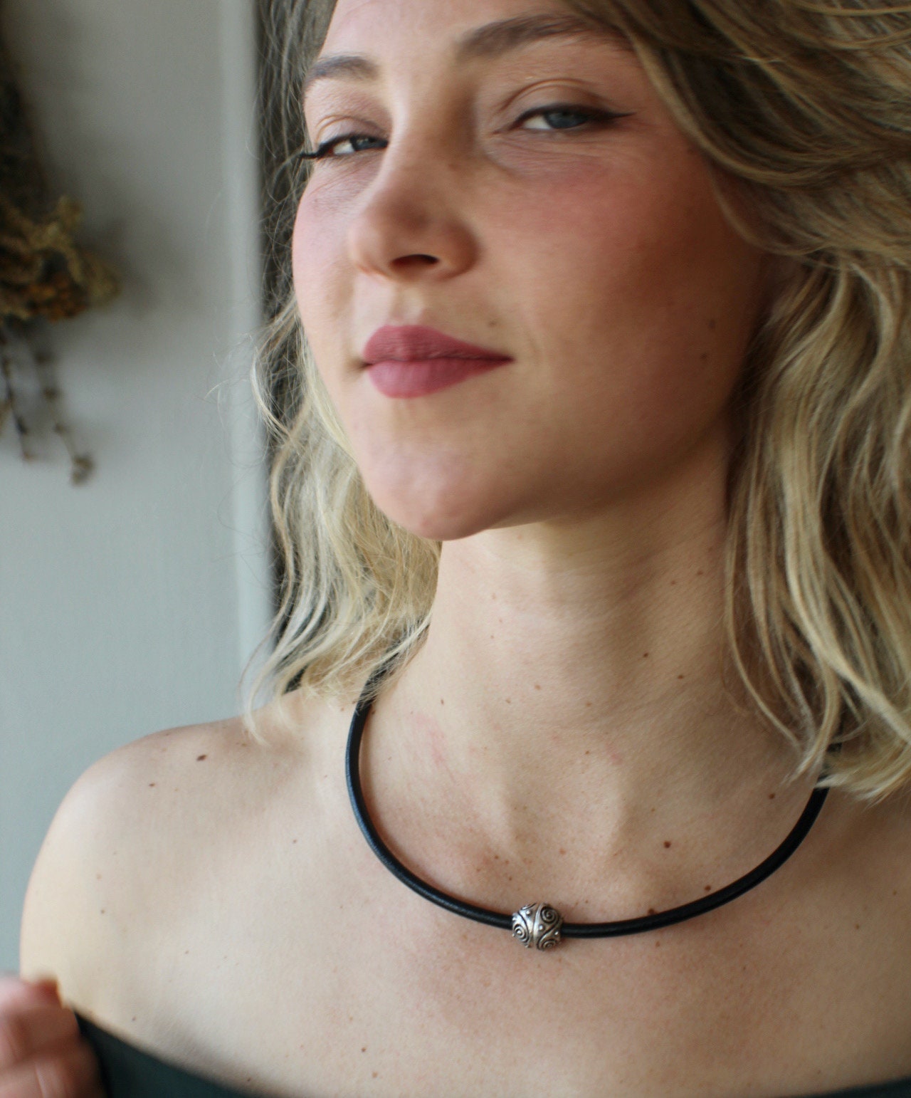 Leather Necklace. Gorgeous black Italian leather choker necklace fashioned with a center silver ornate magnetic clasp.