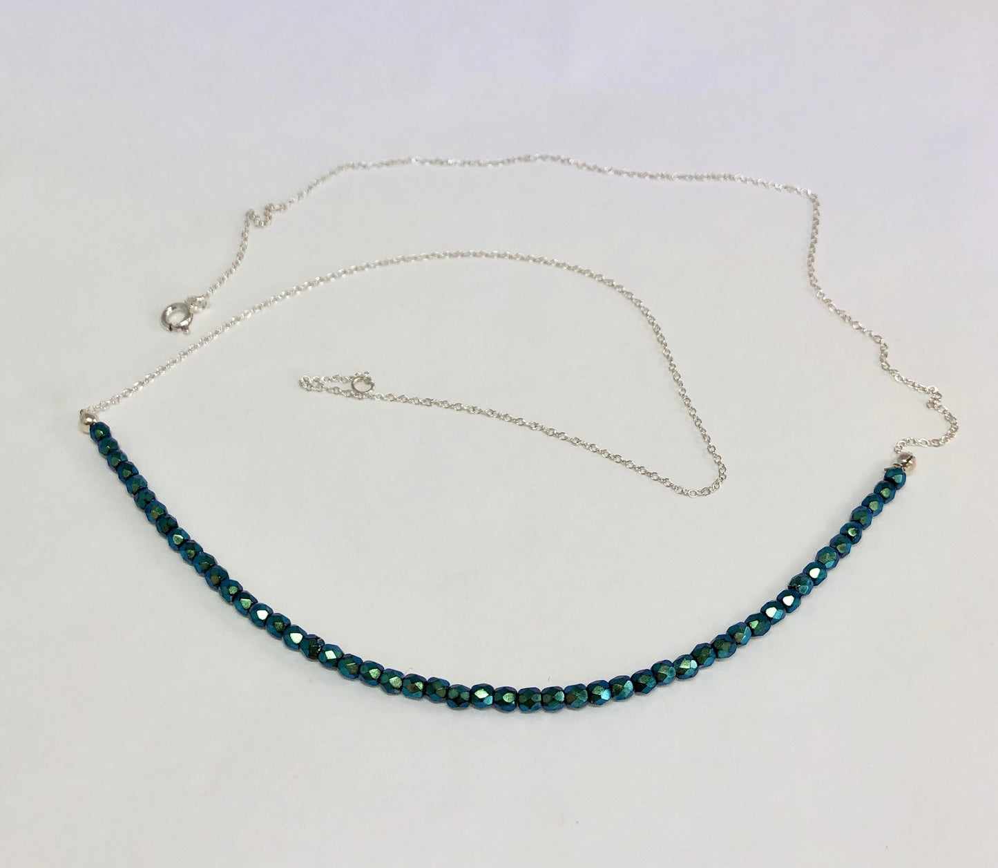 Emerald green crystal and sterling silver choker necklace.