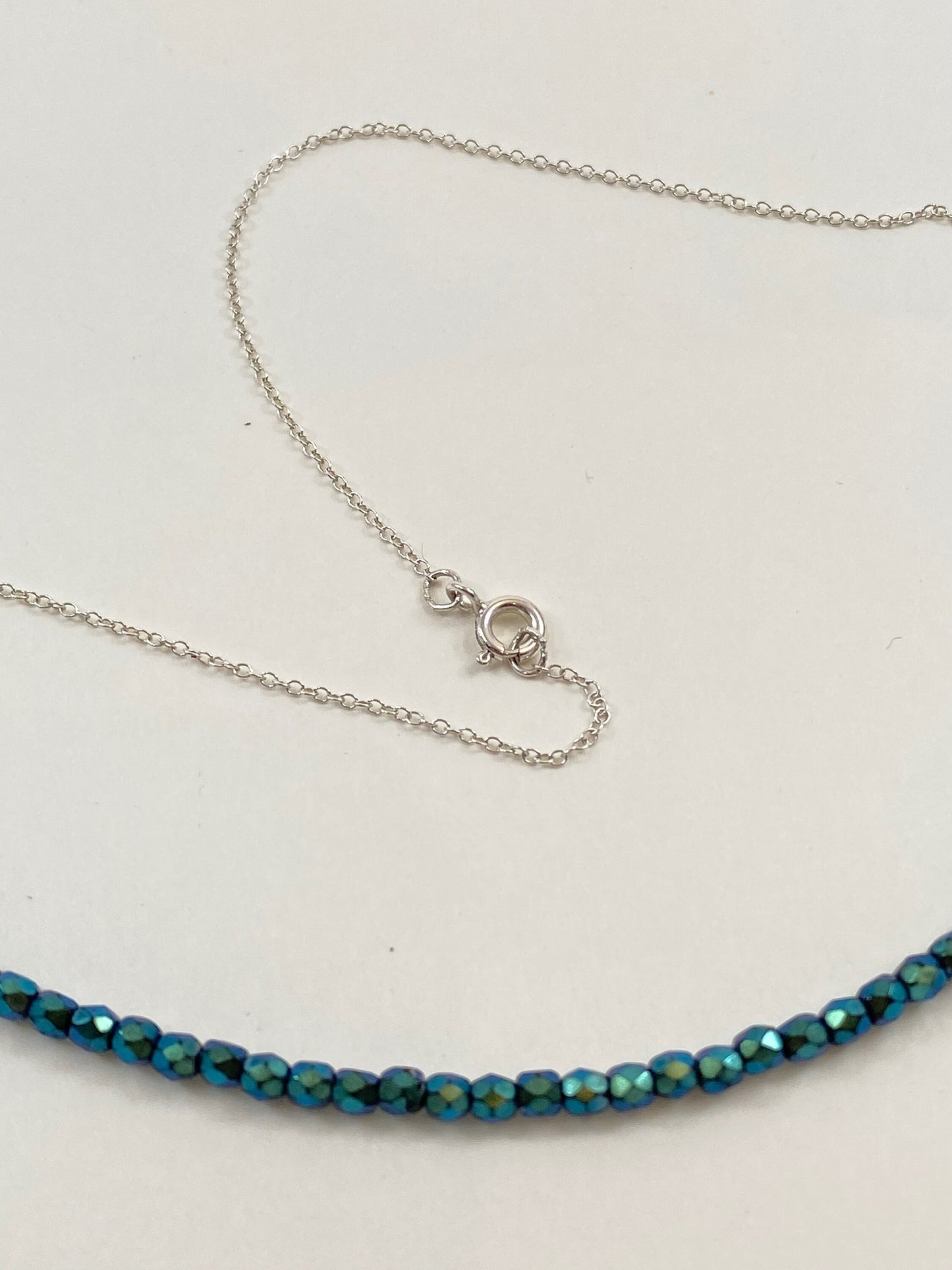 Teal green crystal and sterling silver choker necklace.