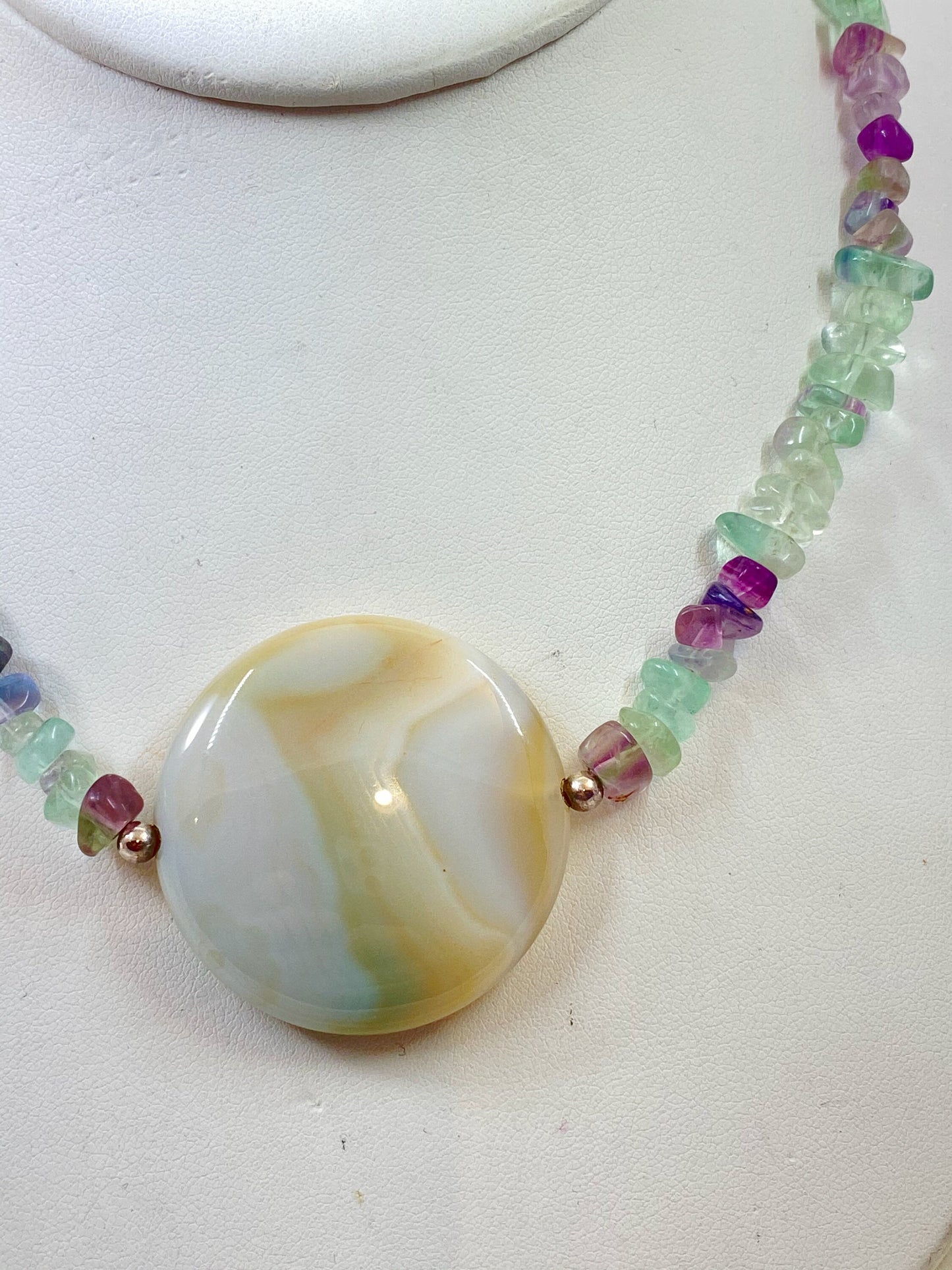 Fluorite and Amazonite beaded necklace. Measures 17" long and is finished with a quality sterling silver toggle clasp.