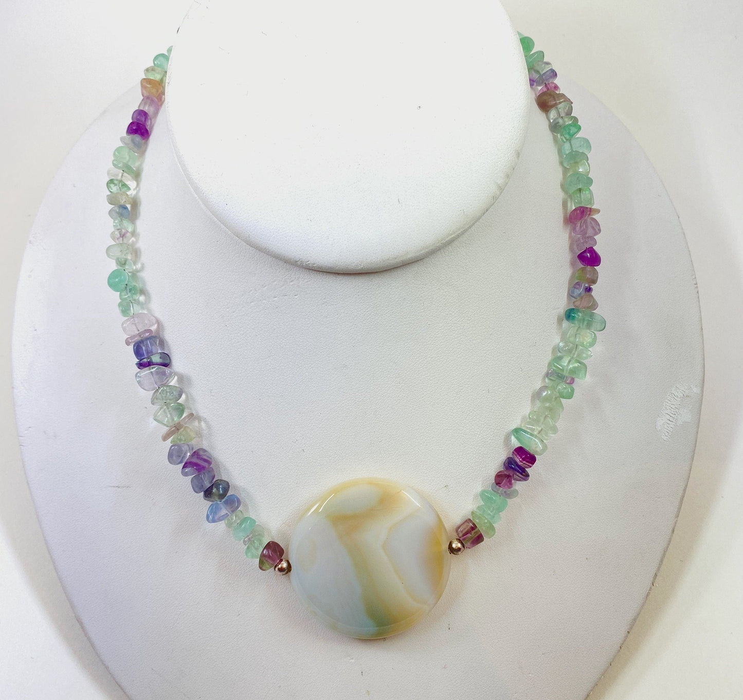 Fluorite and Amazonite beaded necklace. Measures 17" long and is finished with a quality sterling silver toggle clasp.