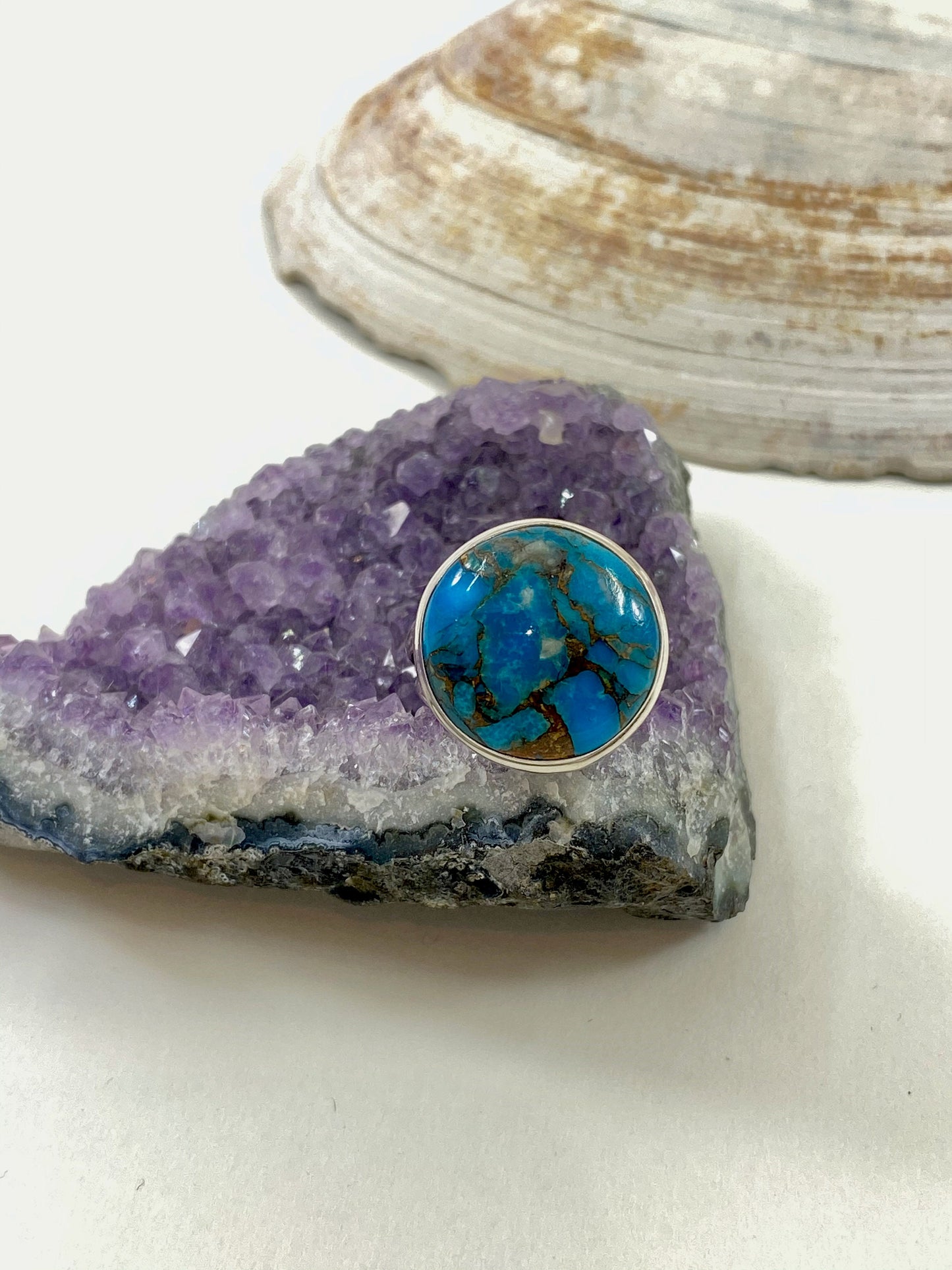 Gorgeous handmade blue and copper turquoise and sterling silver ring. This is a size 7 1/2 stunning ring.