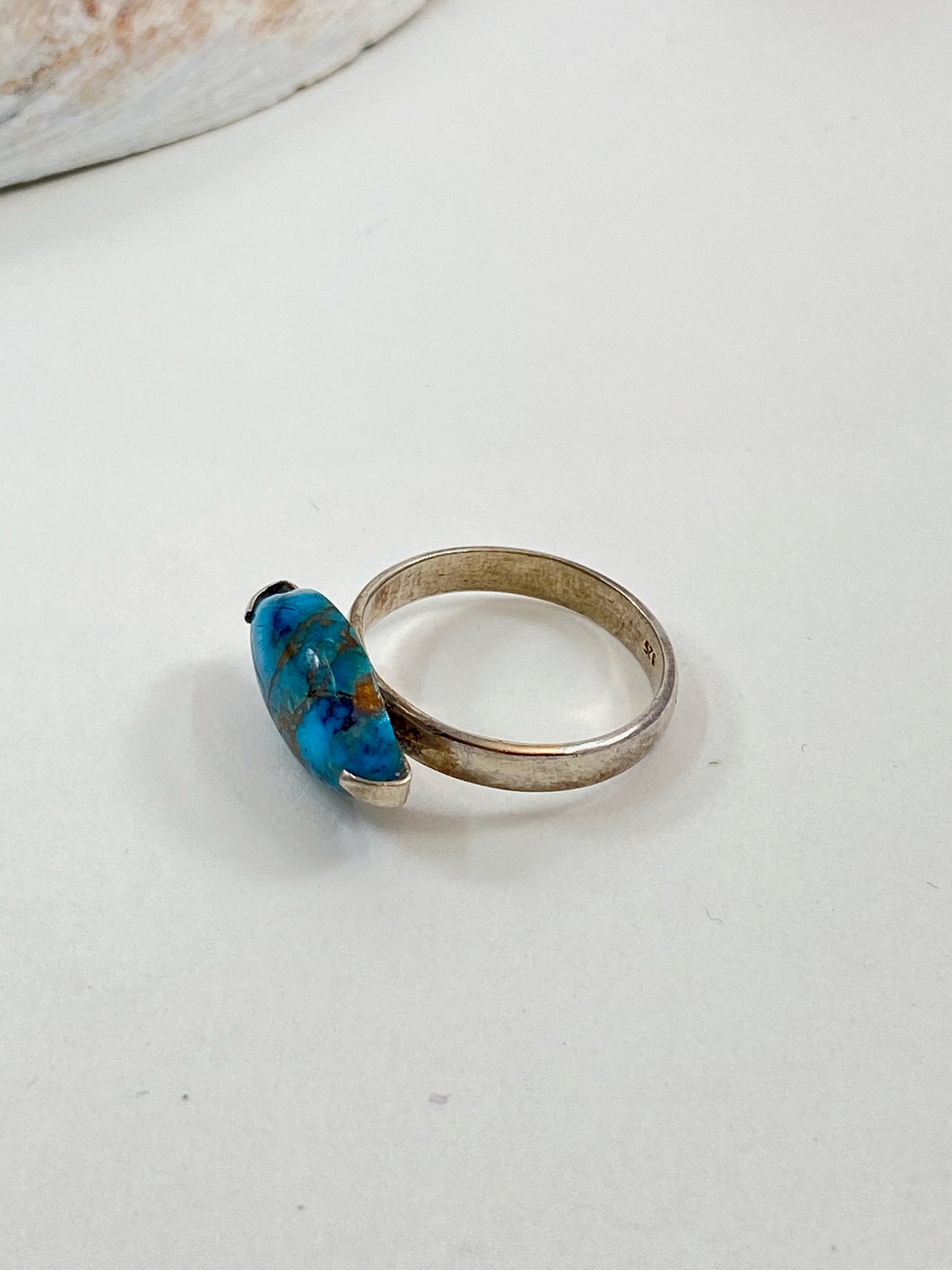 Gorgeous handmade blue and copper turquoise and sterling silver ring. This marquise cut stone is a size 7 3/4 stunning ring.
