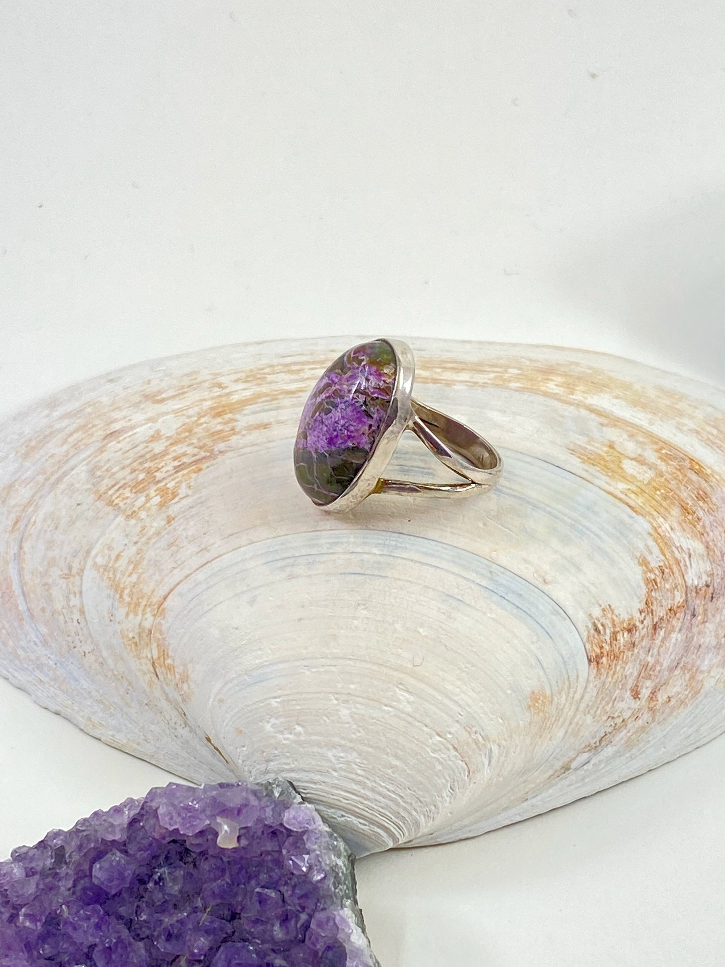 Gorgeous handmade Purperite stone sterling silver ring. This beautiful oval cut stone is a size 6 3/4 stunning ring.