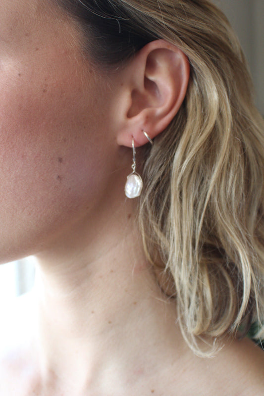 Gorgeous natural white Keisha fresh water pearl earrings on quality sterling silver lever back ear wires.
