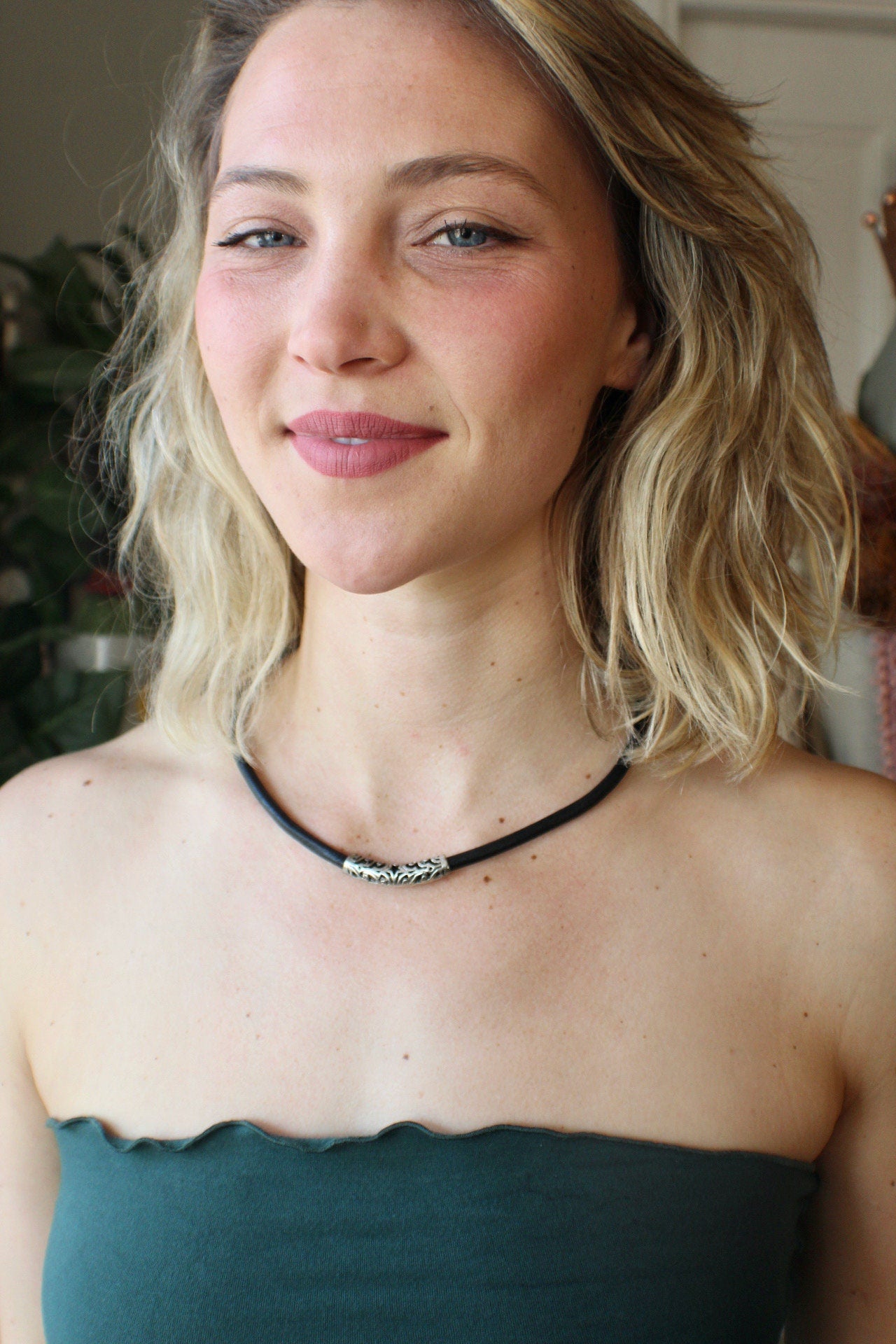 Leather Necklace. Natural black Italian leather choker necklace with ornate star and curved sterling silver tube, finished with accent magnetic clasp.