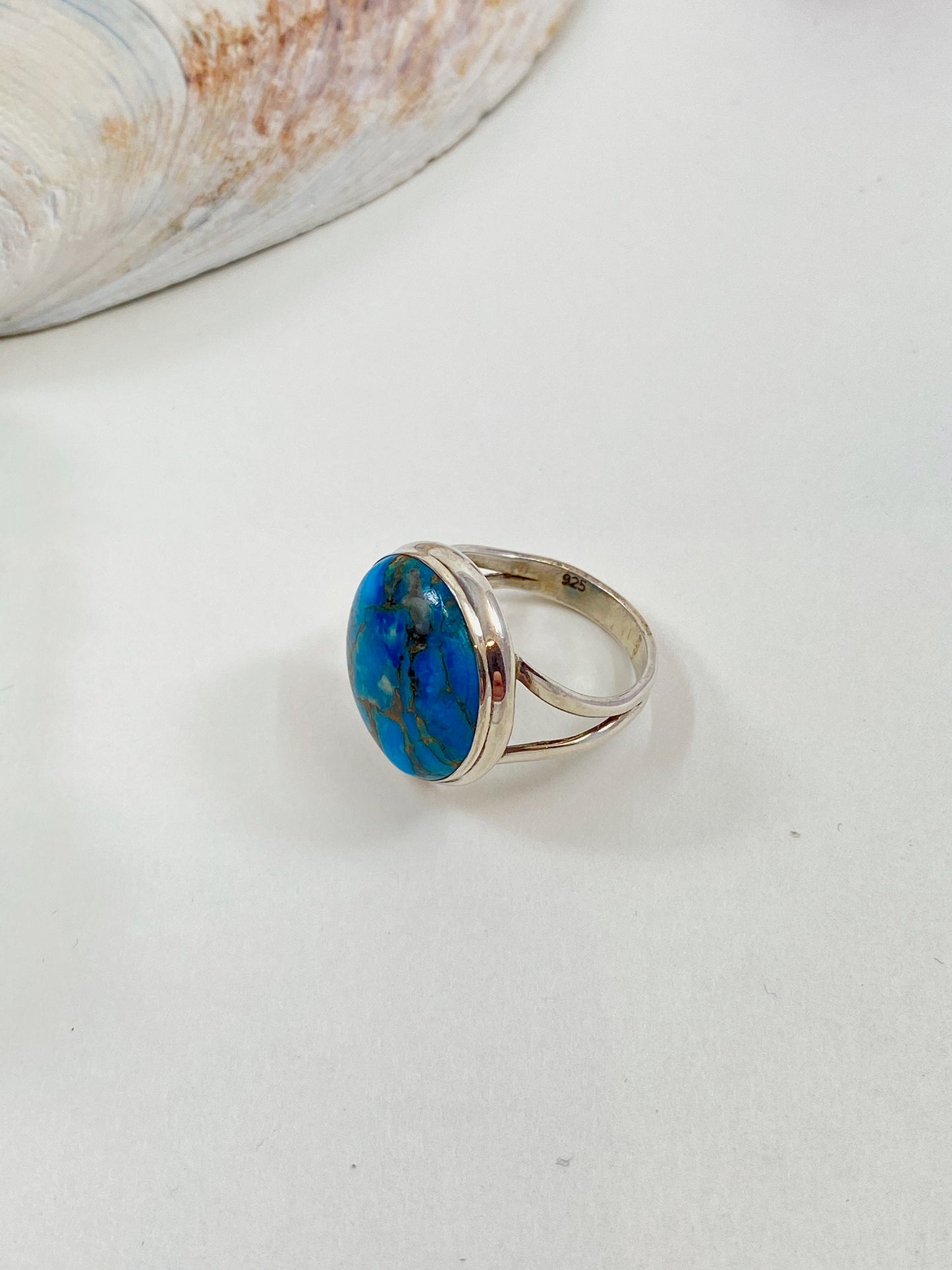 Gorgeous handmade blue and copper turquoise and sterling silver ring. This is a size 7 1/2 stunning ring.