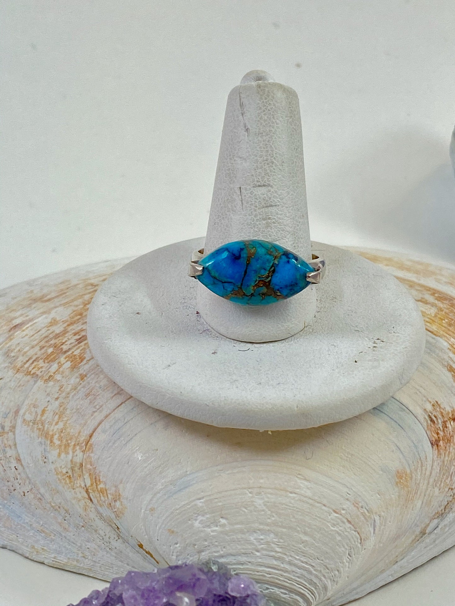 Gorgeous handmade blue and copper turquoise and sterling silver ring. This marquise cut stone is a size 7 3/4 stunning ring.