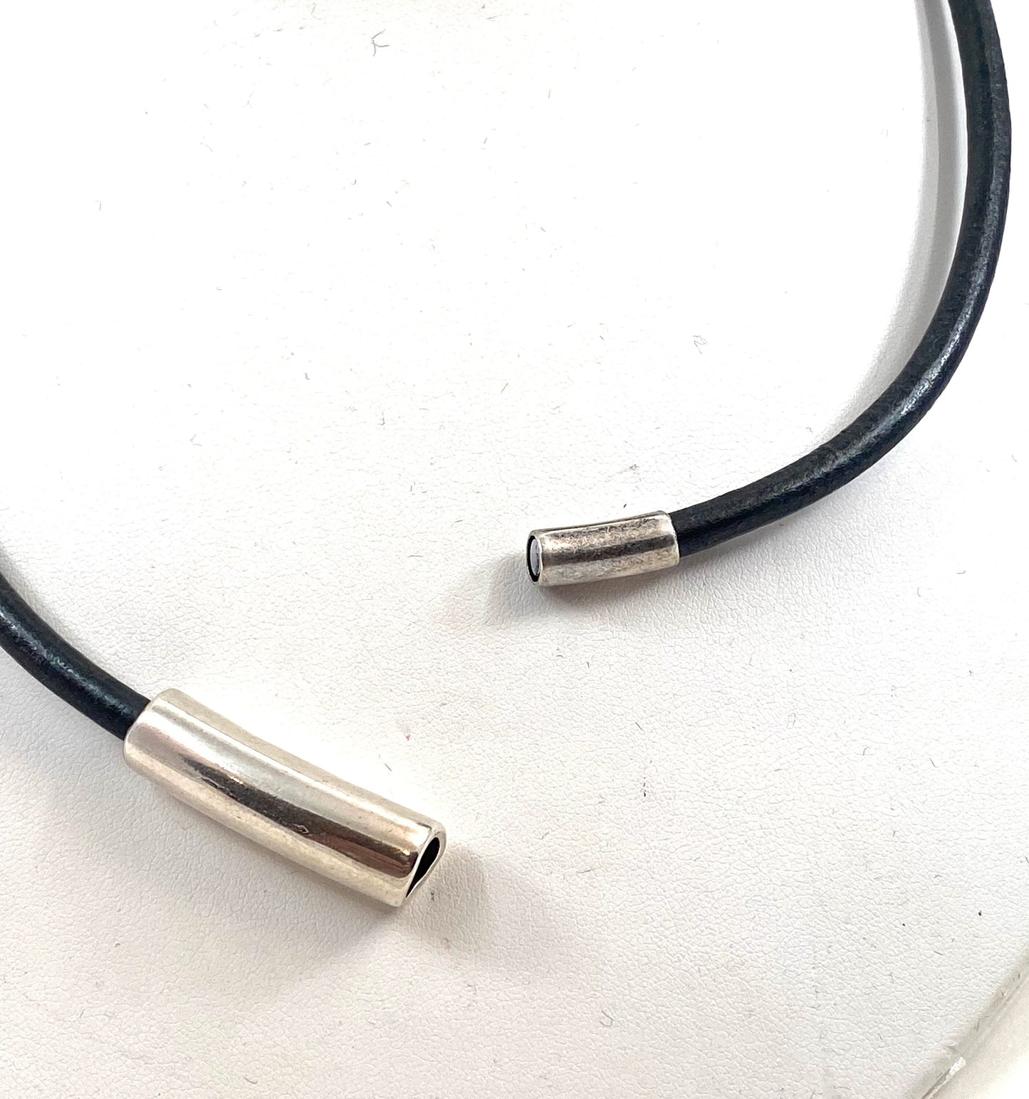 Leather Necklace. Natural black Italian leather choker necklace with a gorgeous curved sterling silver tube, which works  as the magnetic clasp