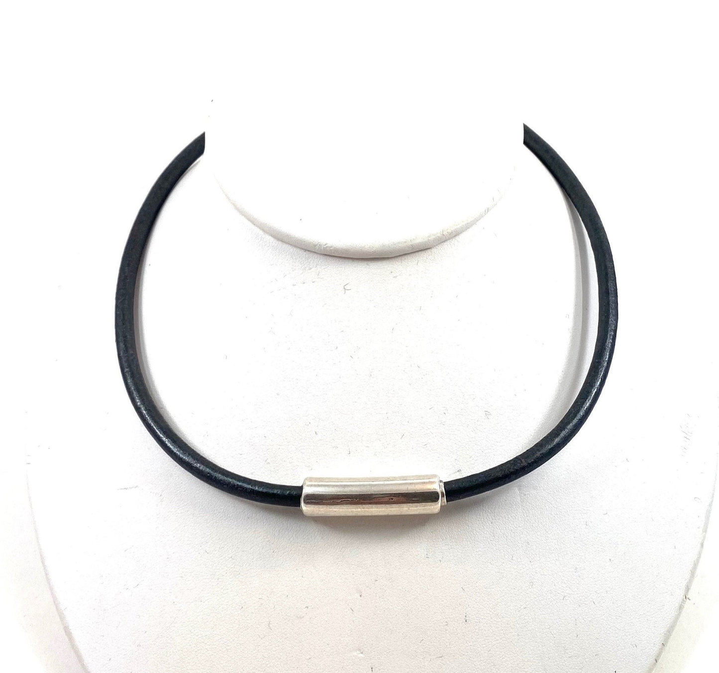 Leather Necklace. Natural black Italian leather choker necklace with a gorgeous curved sterling silver tube, which works  as the magnetic clasp