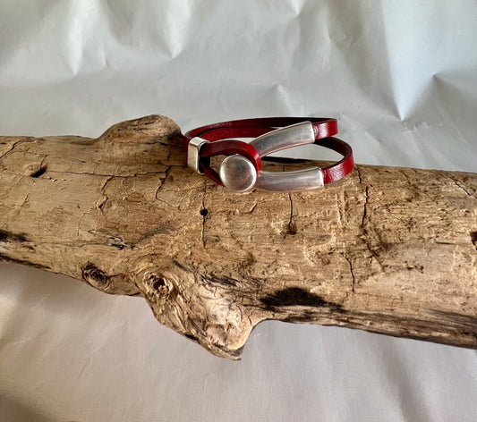 Italian rich red leather bracelet with a silver wishbone button clasp. Half cuff style.  Soft leather and trendy clasp.