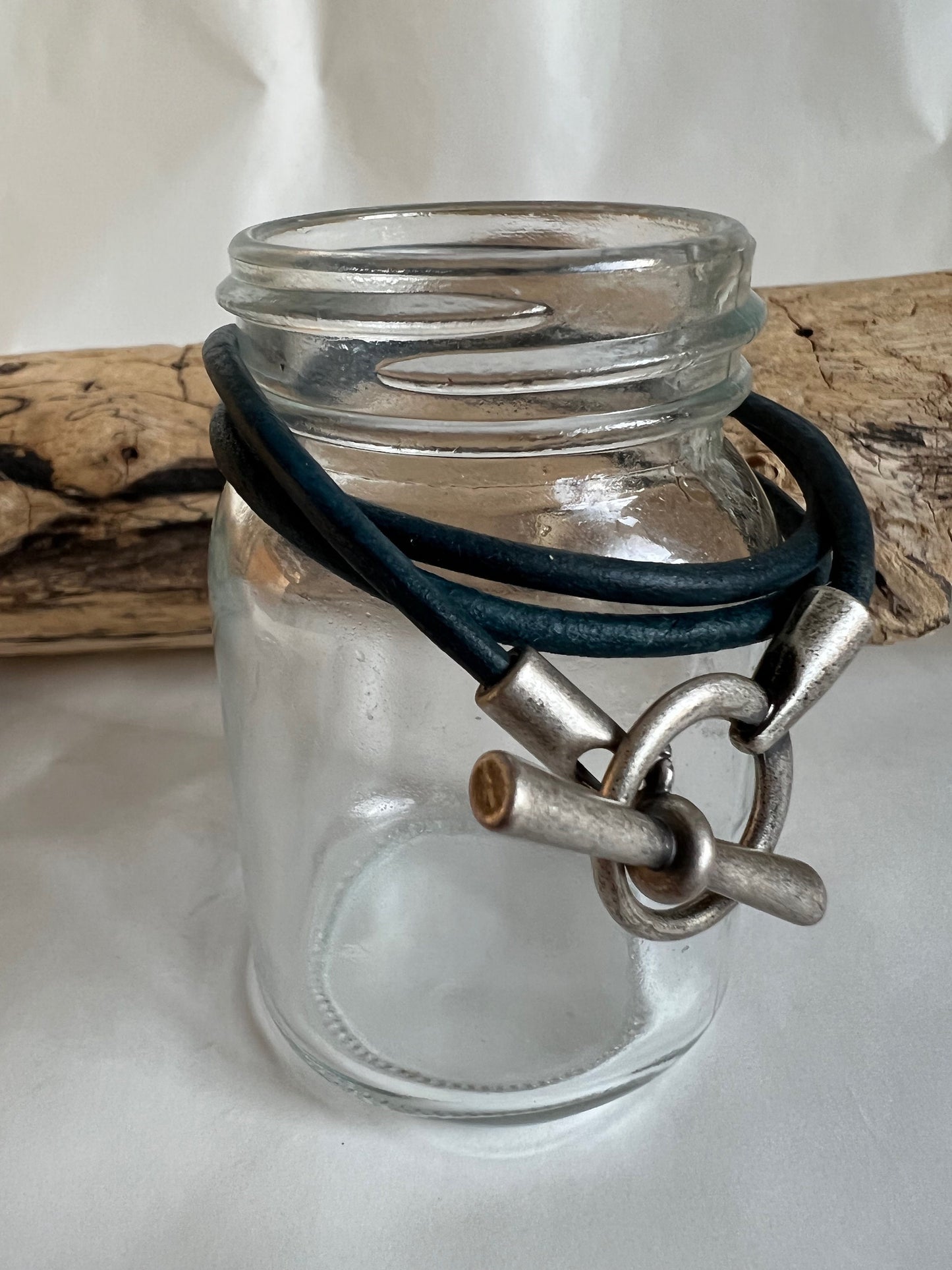 Italian rich dark denim blue  triple wrap leather bracelet with hip silver antiqued toggle clasp. Soft leather and trendy clasp.