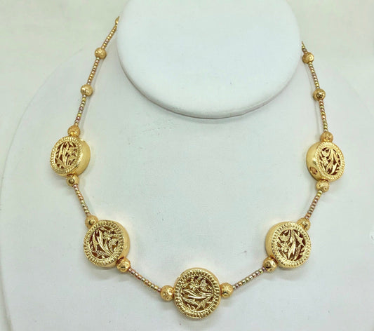 Gold necklace. Beads are filigree and decorated hollow beads. Finished with a quality 14KG filled lobster clasp.