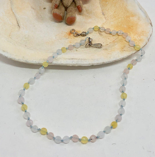 Girl's beaded necklace made of agate stones. Made safely for children, knotted with silk thread.